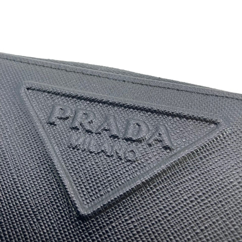 【中古】 PRADA プラダ エンボスロゴ ラウンドジップウォレット 黒 長財布 メンズ 23019613 MK